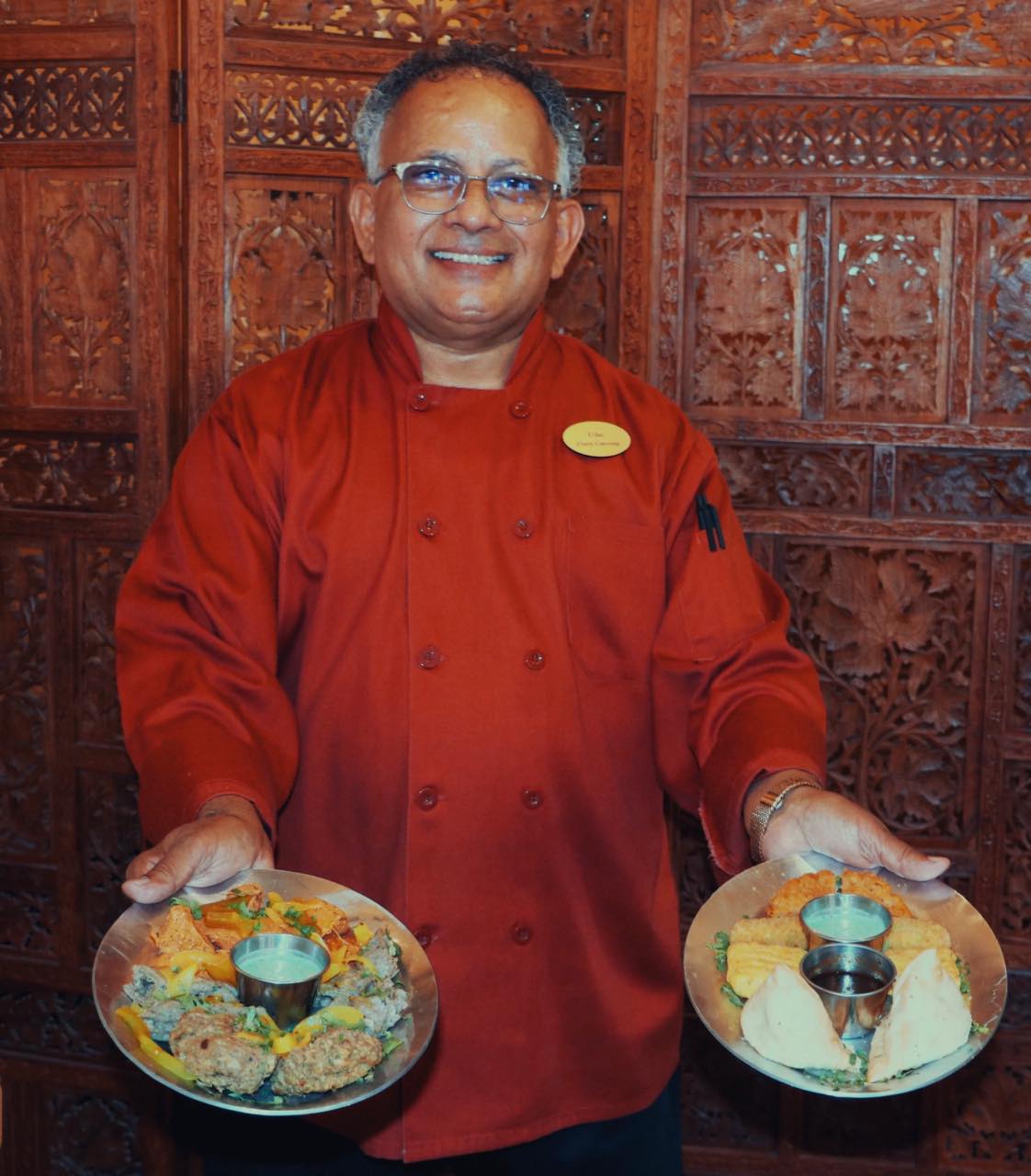 chef uday kadam showing the food he has made