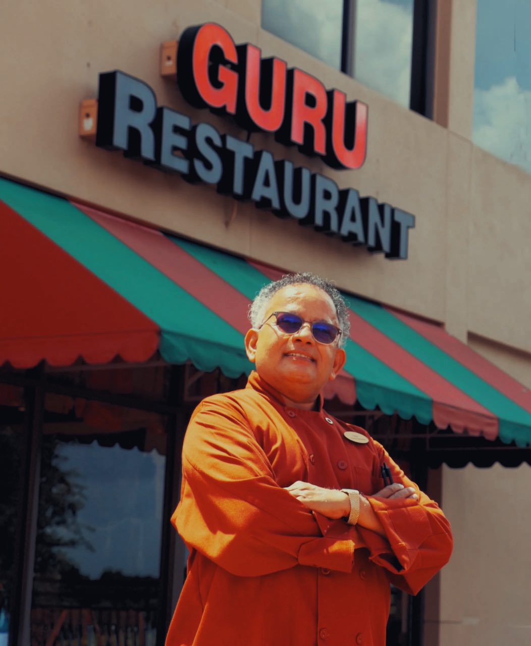 chef uday kadam hero photo outside his restaurant